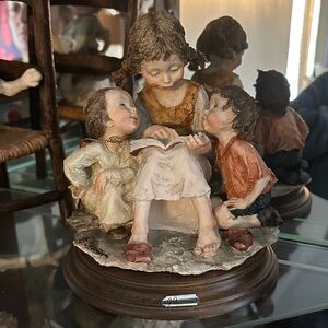 Whimsical Children Reading Sculpture